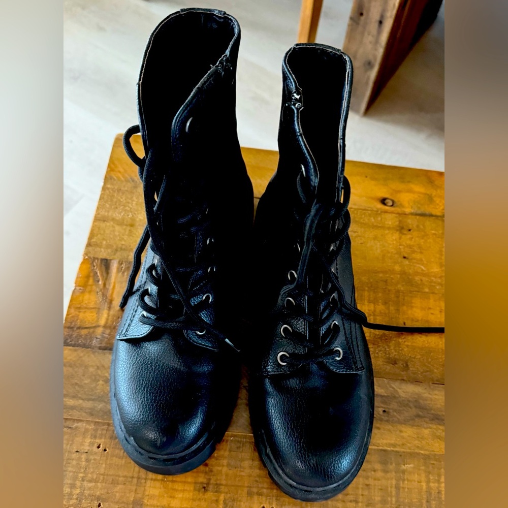 Black Moto boots only worn 1 time. Comfortable with easy to get on zipper.